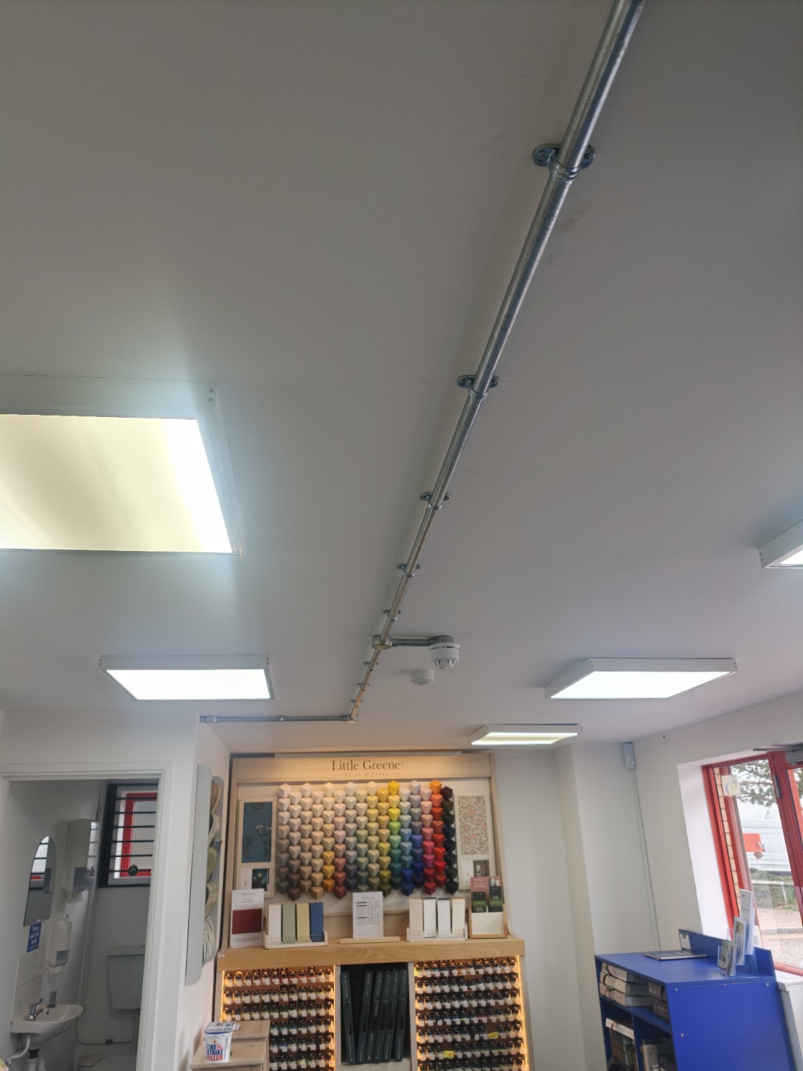 Neatly installed commercial fire alarm system with clear surface-mounted equipment